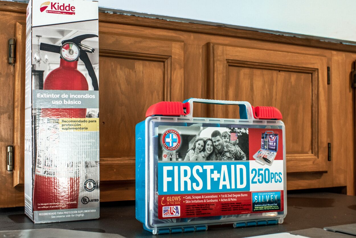 A first-aid kit and a fire extinguisher box.