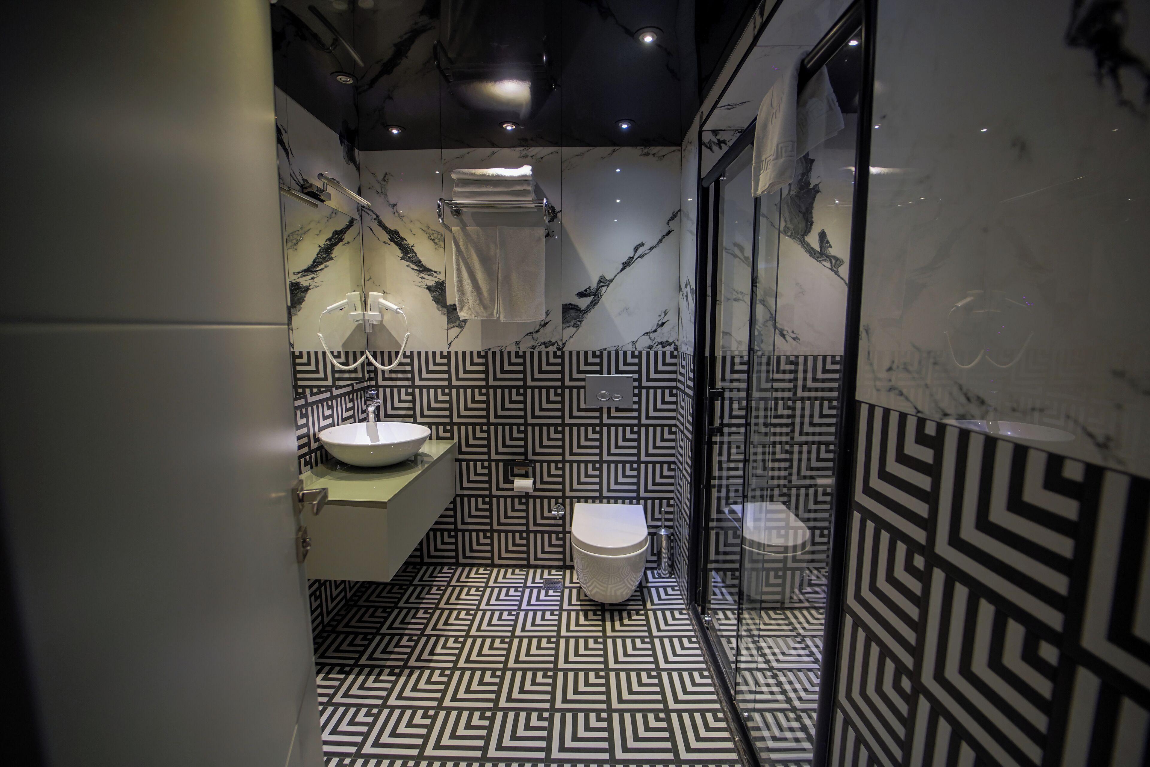 shower, hydromassage showerhead, eco-friendly toiletries, hair dryer