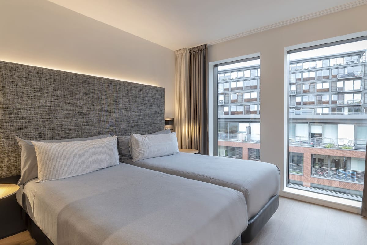 innside twin room | 2 bedrooms, down duvets, free minibar, in-room safe