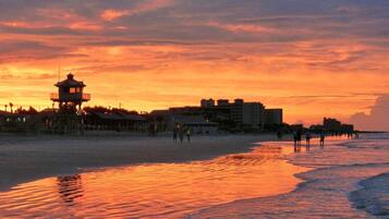 On the beach, sun loungers, beach towels