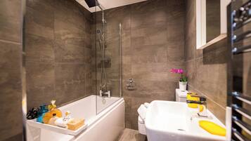 Combined shower/bathtub, hair dryer