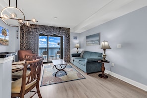 Signature Condo, 1 Bedroom, Ocean View, Oceanfront | Living room - Beachfront Anderson Condos by Hosteeva (Myrtle Beach)