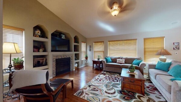 House (120 Winding Meadow by Vacation Rental) | Living room | TV, fireplace, printers