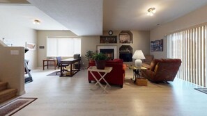 House (120 Winding Meadow by Vacation Rental) | Living room | TV, fireplace, printers
