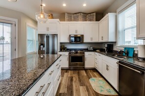 House, 4 Bedrooms | Private kitchen | Fridge, microwave, stovetop, coffee/tea maker