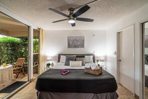 1 quarto, ferros/tábuas de passar roupa, berço de viagem