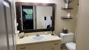 Hair dryer, towels, soap, shampoo