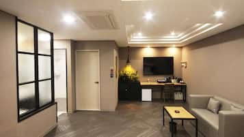 Room (Special, Massage Chair) | Living area | Flat-screen TV