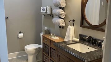 Shower, hair dryer, towels