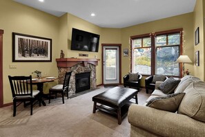 Smart TV, fireplace, DVD player, books - Mountain Bliss: Cozy Solitude Condo, Heated Pool and Hot Tub, Game Room, Parking, Patio, Fireplace! (Solitude)