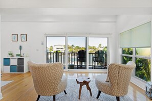 TV, fireplace, table tennis, stereo - Waterfront Escape—Private Pool, Game Room, Hot Tub & Dockside Views Near Indian Rocks Beach (Indian Rocks Beach)