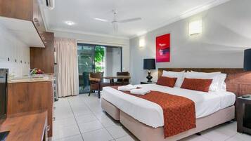 Deluxe Studio, 1 King Bed, Pool Access, Ground Floor | Premium bedding, individually decorated, individually furnished