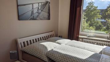 2 bedrooms, travel crib, WiFi, bed sheets