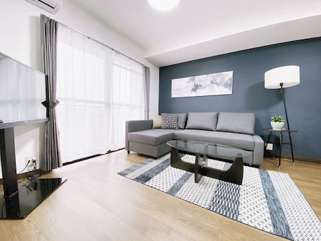 3 Bedroom Apartment with Balcony 302 | Living area. OUCHI HOTEL Itsukaichi