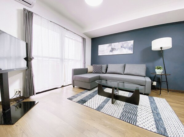 3 Bedroom Apartment with Balcony 302 | Living area | 40-inch flat-screen TV with digital channels, TV