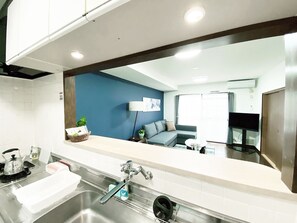 3 Bedroom Apartment with Balcony 301 | Private kitchenette | Fridge, microwave, electric kettle, cookware/dishes/utensils