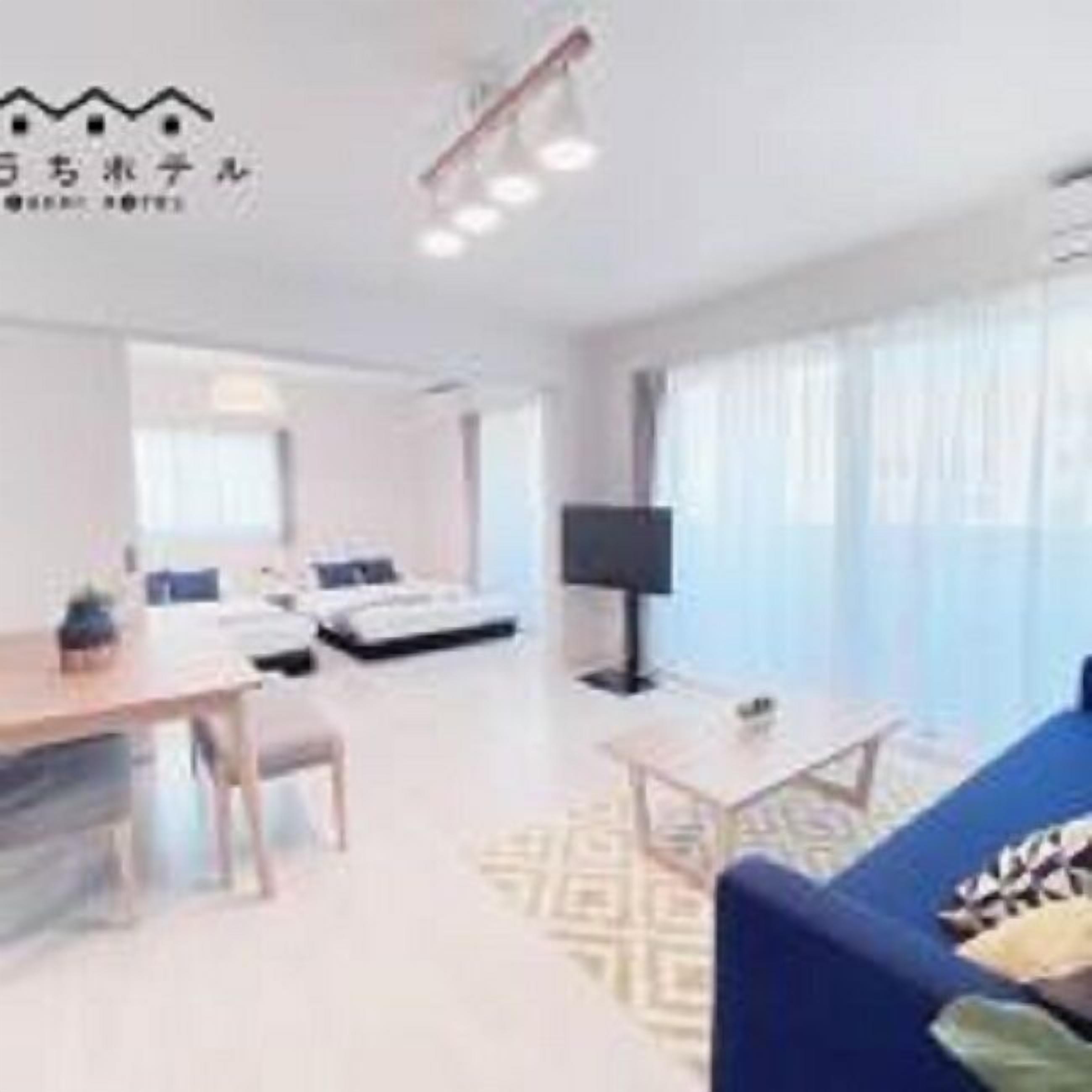1 Bedroom Apartment with Balcony 203 | Living area | 40-inch flat-screen TV with digital channels, TV
