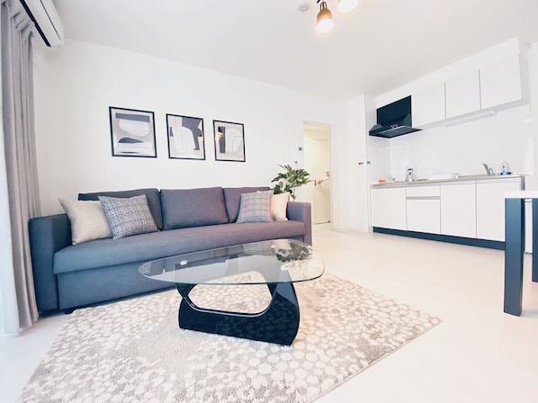 Appartement, 1 chambre, balcon (103) | Coin séjour | Télévision à écran plat de 40 pouces avec chaînes numériques, télévision