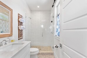 Shower, hair dryer, towels