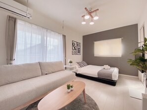 Studio with Balcony 201 | Living area | 40-inch flat-screen TV with digital channels, TV