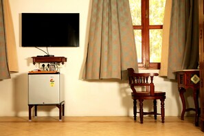 Suite Superior | Area soggiorno | TV