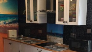 Cottage, Beberapa Tempat Tidur | Dapur pribadi | Lemari es, microwave, kompor, dan ketel listrik