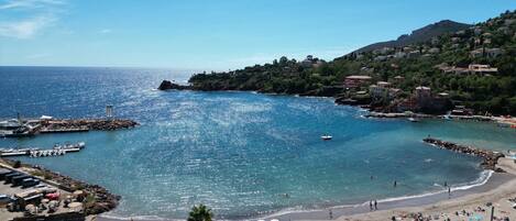 On the beach, sun loungers, beach towels