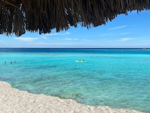 On the beach, sun-loungers, beach towels