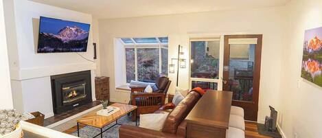 Smart TV, fireplace, table tennis, books