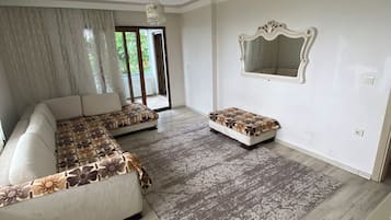 Apartment, 3 Bedrooms | Living area | LCD TV