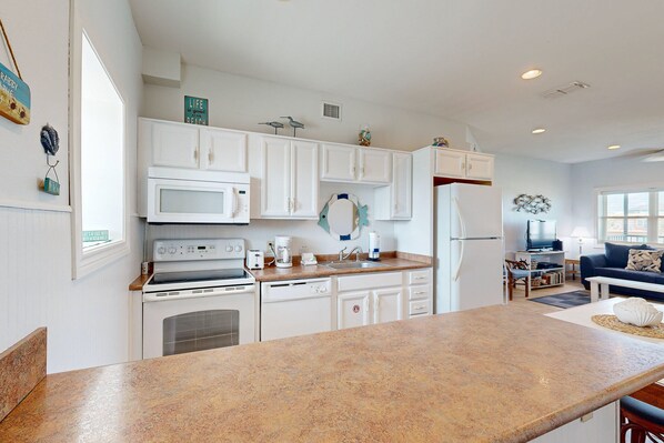 Fridge, microwave, dishwasher, coffee/tea maker