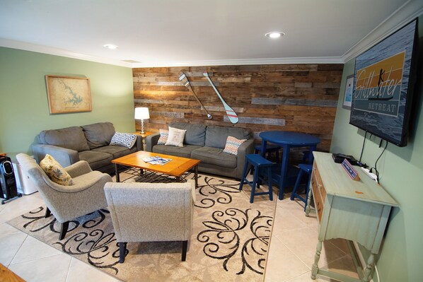 Smart TV, fireplace, DVD player, foosball