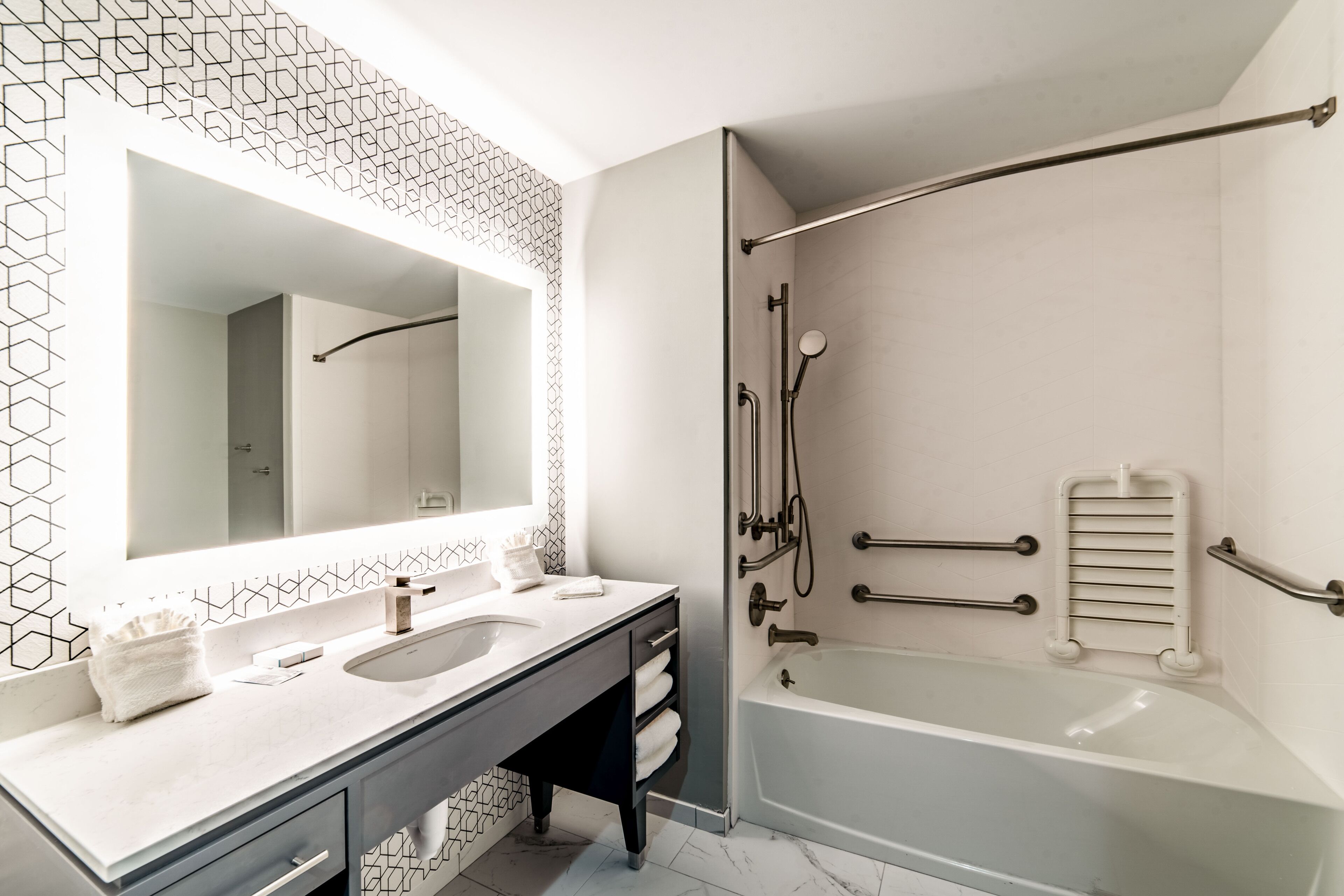 suite, 1 king bed with sofa bed, accessible, kitchenette | bathroom | free toiletries, hair dryer, towels, soap