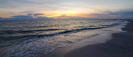 On the beach, sun-loungers, beach towels