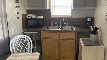 Fridge, microwave, coffee/tea maker, toaster