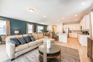 Flat-screen TV, video game console, table football, ping pong