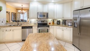 Microwave, oven, stovetop, dishwasher - Picture This... Renting the Perfect Luxury Apartment on Reunion Resort, Orlando Apartment 3809 (Kissimmee)
