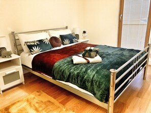 2 bedrooms, premium bedding, iron/ironing board, free WiFi