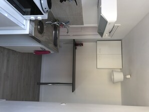 Microwave, dishwasher, coffee/tea maker, cookware/dishes/utensils