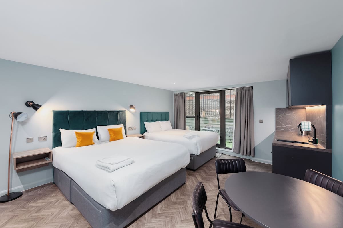 Family Studio Suite (With Terrace) | Hypo-allergenic bedding, soundproofing, iron/ironing board