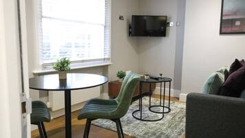 Apartment | Living area | 42-inch TV with cable channels, Netflix, streaming services