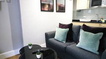 Apartment | Living area | 42-inch TV with cable channels, Netflix, streaming services