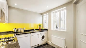 Apartment | Private kitchen | Full-size fridge, microwave, oven, stovetop