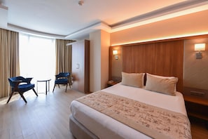 Premium bedding, minibar, desk, soundproofing