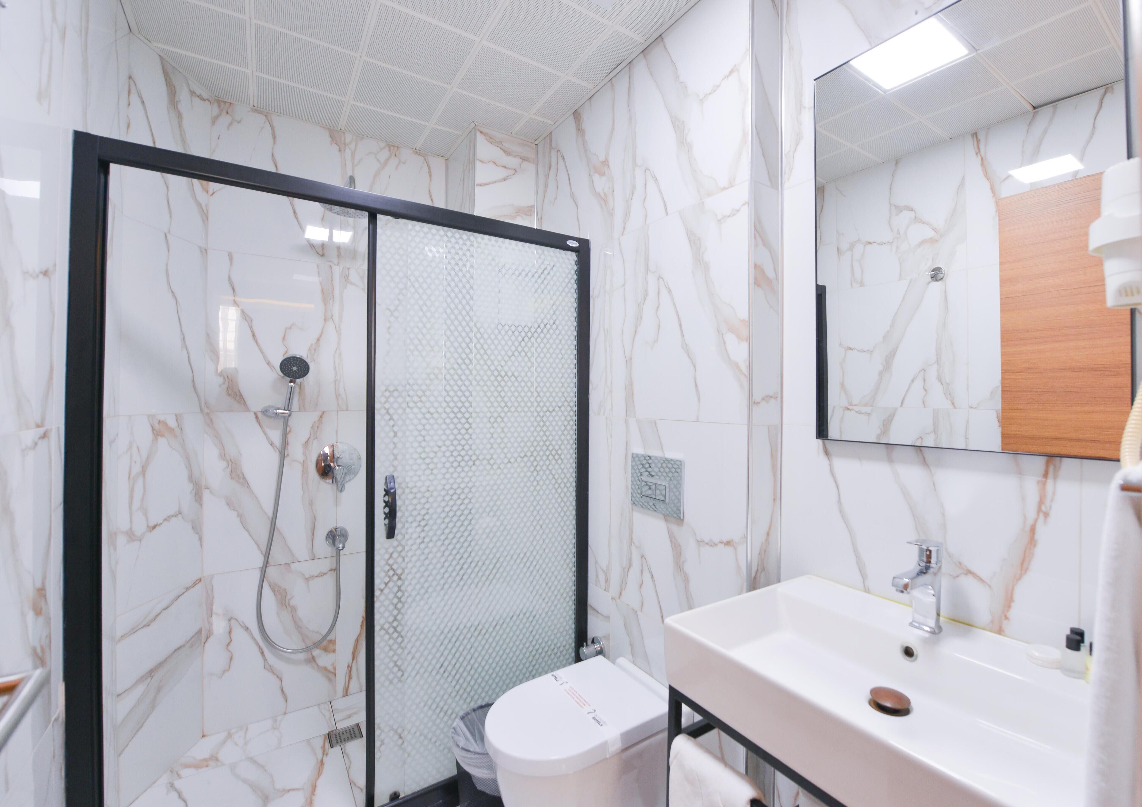 family quadruple room | bathroom | shower, towels