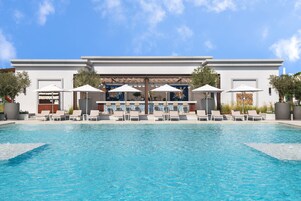 Outdoor pool, open 8:00 AM to 8:00 PM, sun loungers, lifeguards on site