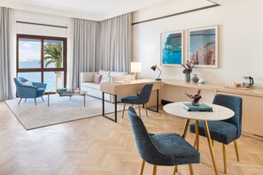 Suite, 1 Bedroom, Sea View | Living area | 50-inch LCD TV with digital channels, TV