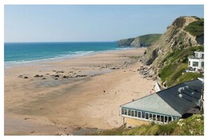 Guests can enjoy stunning ocean views from this beachfront property.
