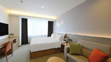 Suite, 1 King Bed, City View | In-room safe, blackout drapes, iron/ironing board, WiFi (free)