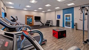 A gym with treadmills, weight racks, and exercise equipment. - Hampton Inn by Hilton Brockville (Brockville)